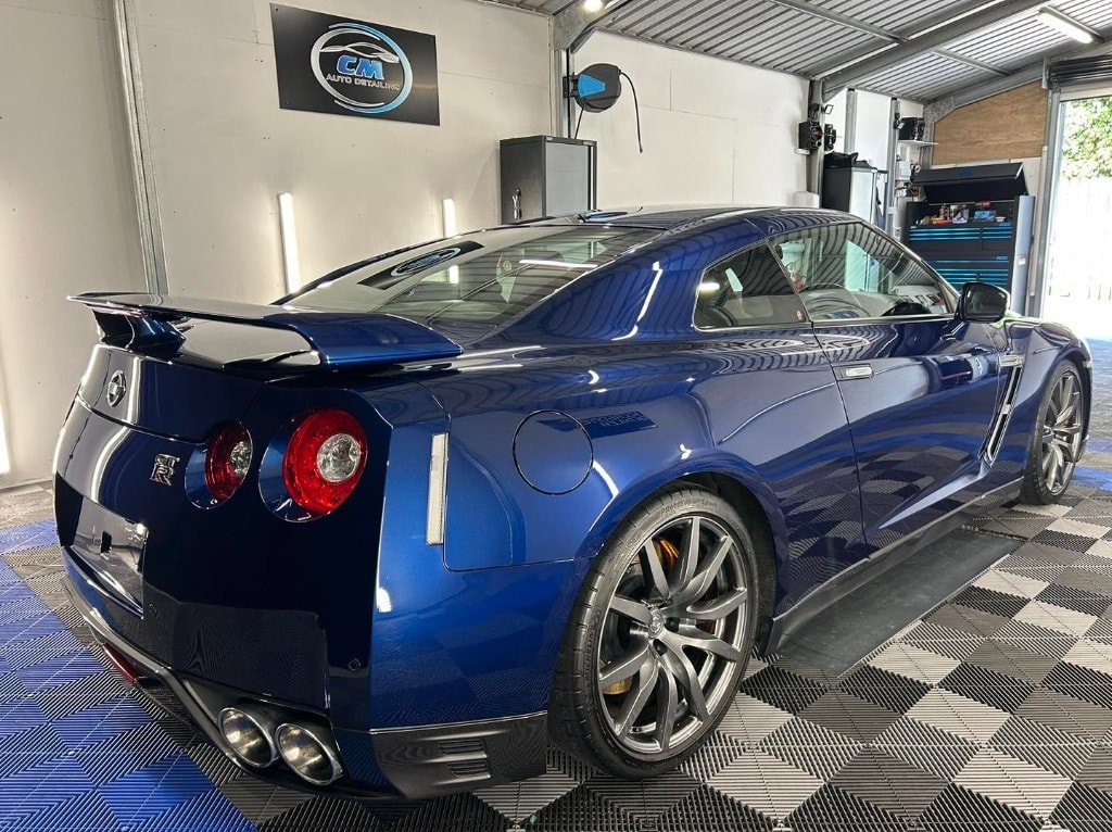 Blue Nissan GT-R rear quarter after detailing