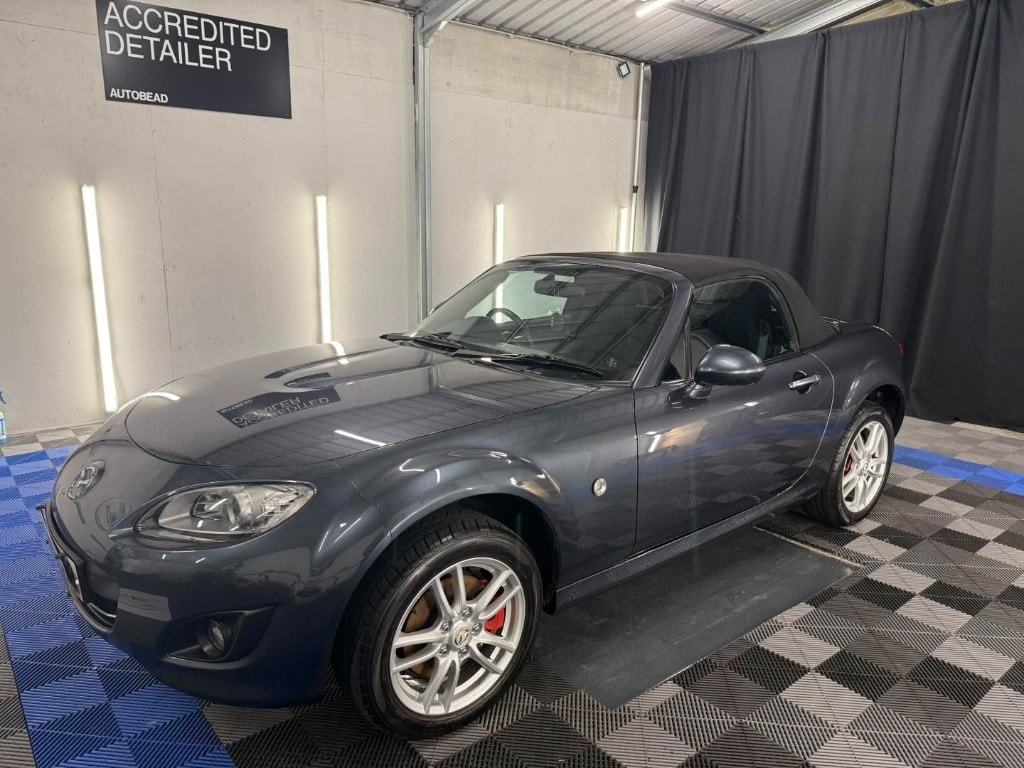 Grey Mazda MX-5 front quarter with a deep gloss finish