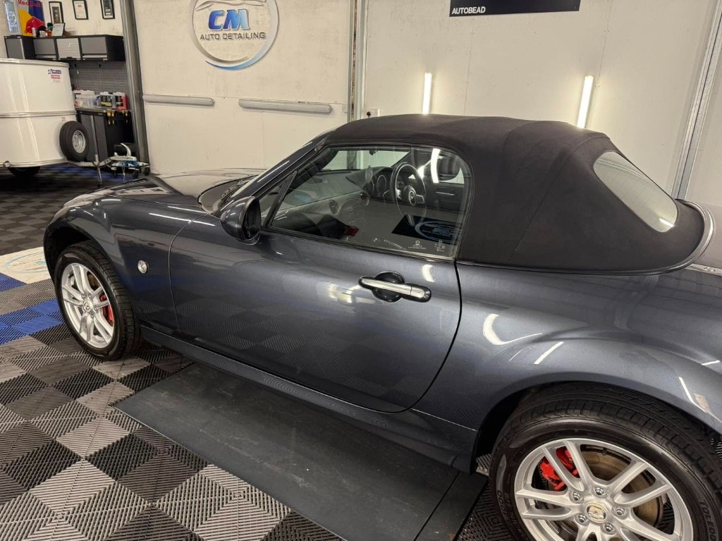 Grey Mazda MX-5 side profile after detailing