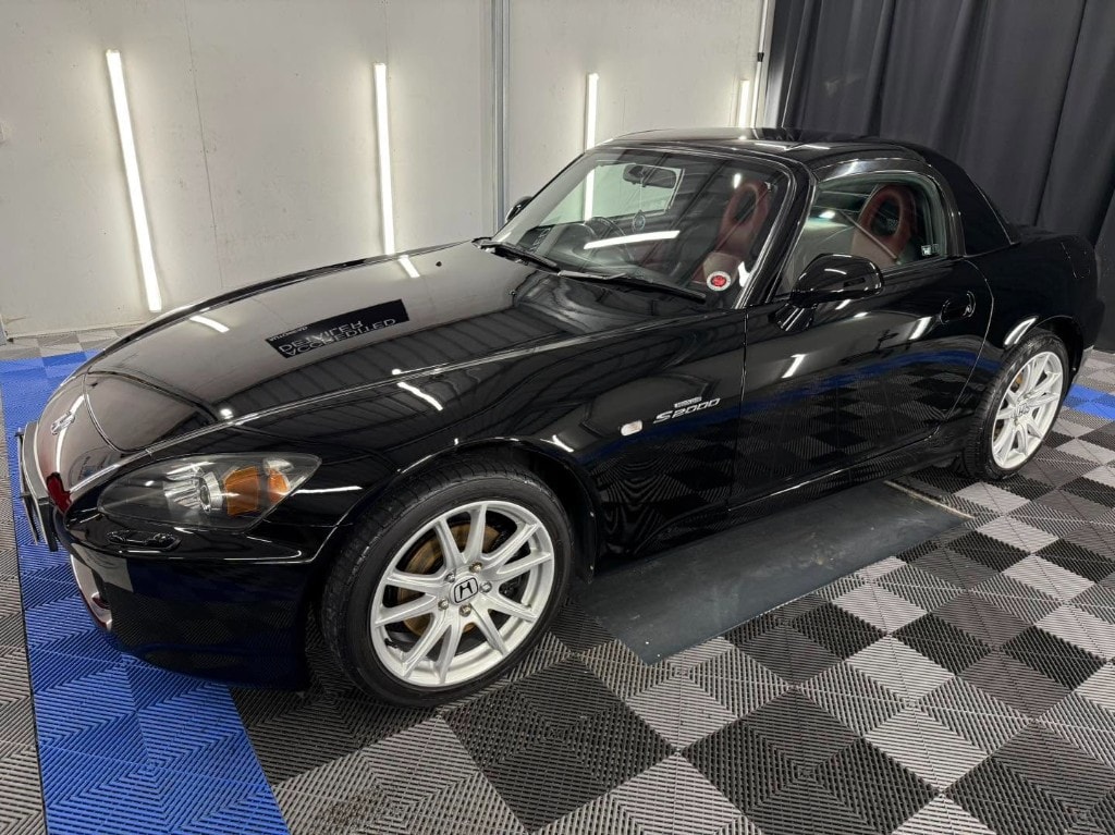 Black Honda S2000 side profile after detailing