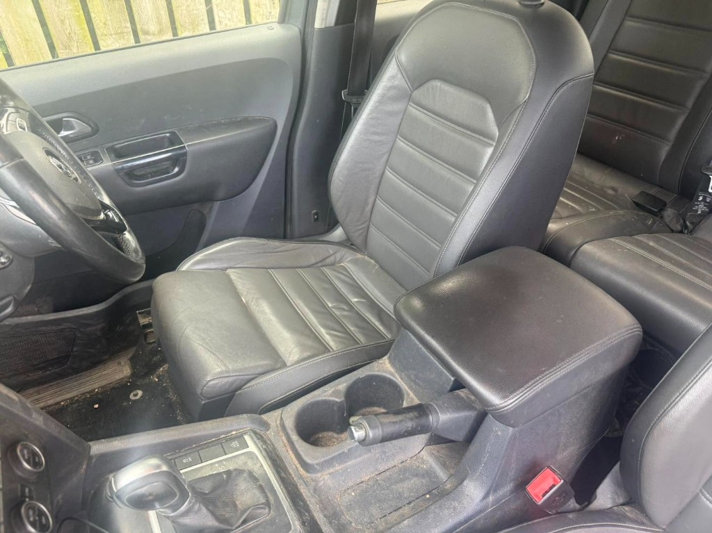 Soiled, dusty leather interior before a deep clean